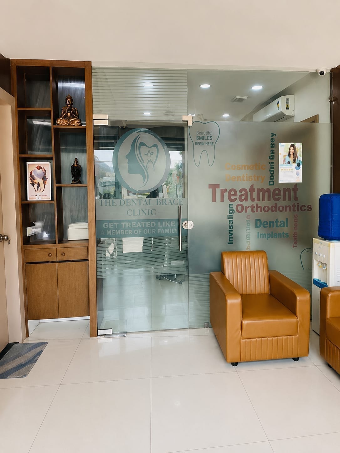 Entrance glass door and reception area of The DentalBrace Clinic Bathinda — welcoming interior layout with modern branding elements
