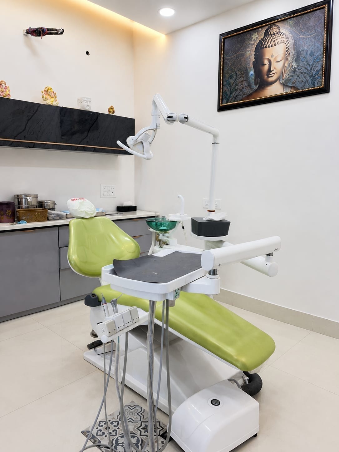 Green dental treatment chair and modern dental operatory room setup at The DentalBrace Clinic Bathinda — designed for patient comfort and clean hygiene