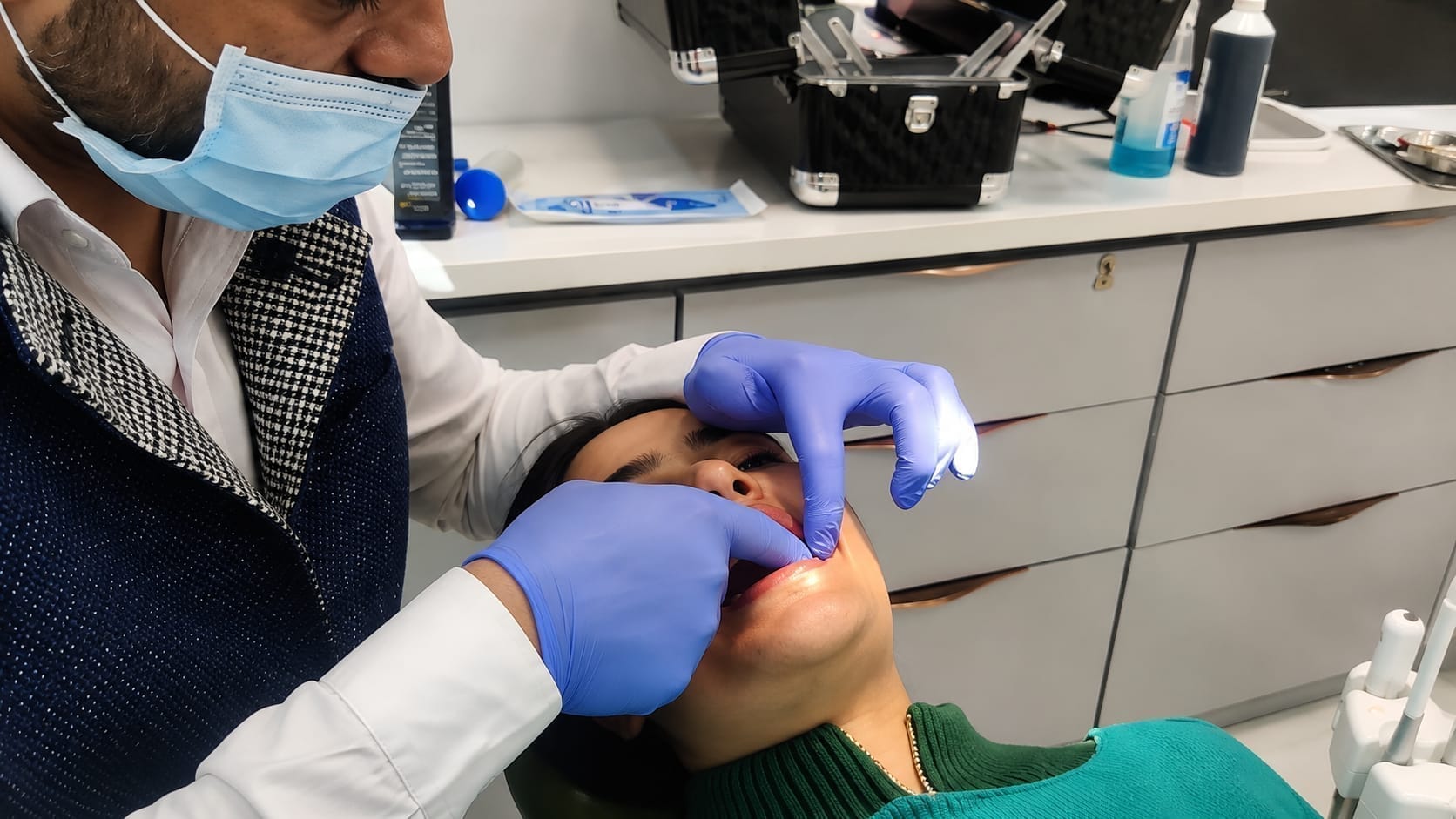Invisalign clear aligners orthodontic treatment result at The DentalBrace Clinic Bathinda — patient Dr. Keerat showing perfectly aligned teeth after clear aligner therapy by Dr. Sandeep Kumar MDS Orthodontist, best Invisalign specialist in Bathinda Punjab India
